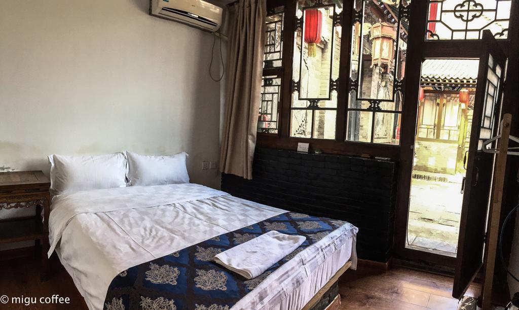 Hotel Fly By Knight Pingyao Courtyard Exterior foto